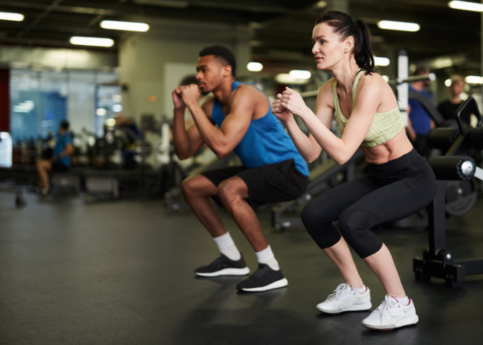 FITNESS CLASSES Chigwell Man and woman exercising at the gym